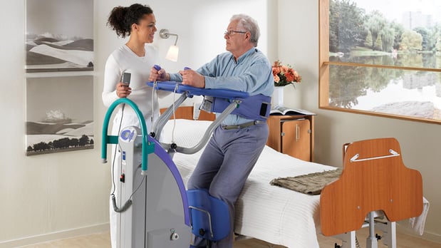arjohuntleigh-patient-transfer-solutions-standing-and-raising-aids-sara-plus-nurse-helping-patient-off-bed.jpg arjohuntleigh-patient-transfer-solutions-standing-and-raising-aids-sara-plus-nurse-helping-patient-off-bed.jpg